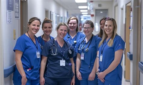 A Group Of Women In Blue Uniforms With The Name Stethos On Them