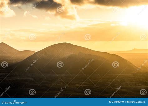 Beautiful Sun Rays Over El Cuervo Volcano In Lanzarote Canary Islands