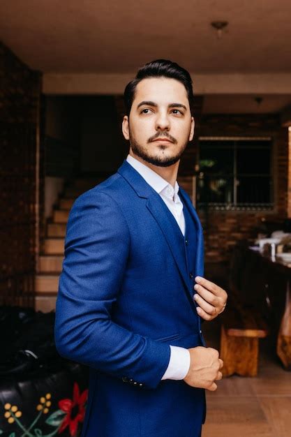 Premium Photo Handsome Man In Blue Suit Photo