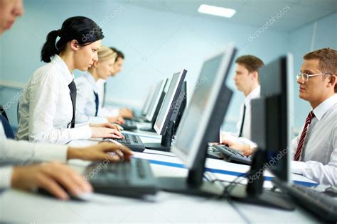 workers working  computers stock photo  pressmaster