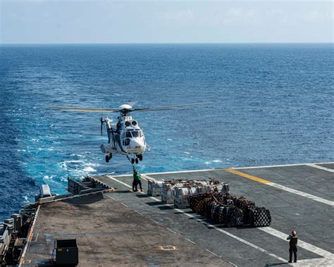 DVIDS - Images - Sailors Secure Cargo To A Helicopter On Flight Deck ...