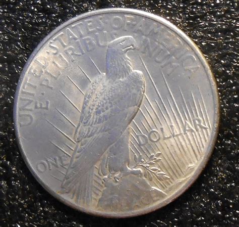 Help me evaluate this 1922 Peace Dollar! Could this be a high relief ...