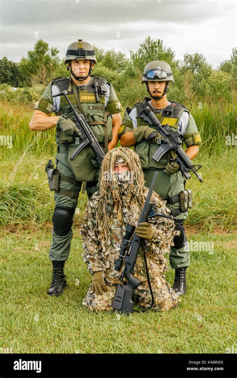 Three Members Of The Hillsborough County Sheriff S Office Swat Team With Full Gear And One In A