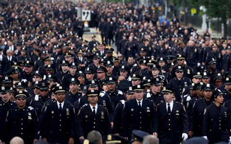 Thousands Mourn Slain Nypd Officer At Funeral