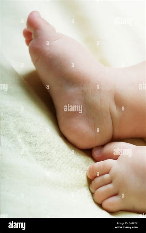 Close Up Of Baby S Feet Stock Photo Alamy