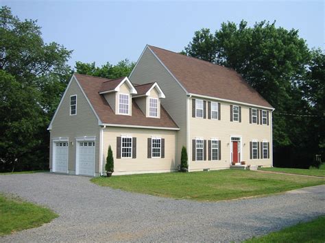 Classic Colonial Custom Modular Home With Two Car Garage And Dog House