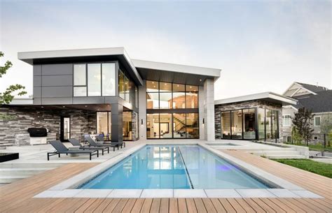 Modern home backyard with a pool and fire pit. Exterior view of the ...