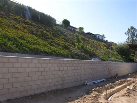 How To Build A Retaining Wall On Steep Slope Wall Design Ideas