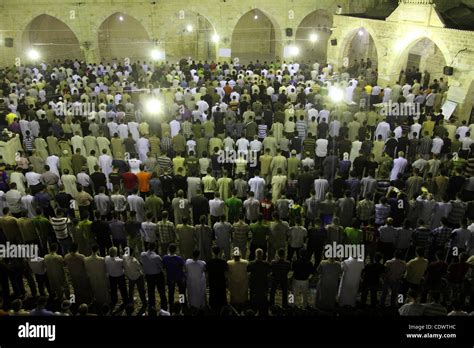 Palestinian Muslims Pray Al Taraweeh Prayer At Al Omari Mosque During