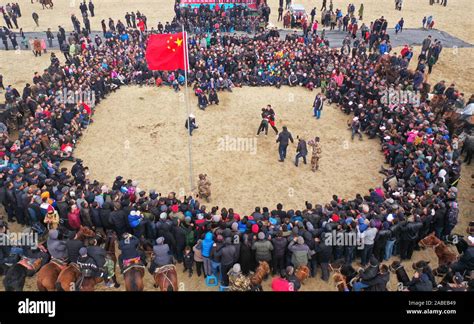 People Watch Wrestling At The Sports Game In Altay City North West