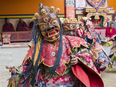 Tibetan Buddhist Lamas Perform A Ritual Dance In The Monastery Of