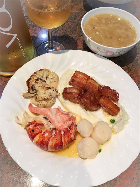 Butter Poached Lobster Tail Orange Marmalade Pork Belly Butter Herb Scallops Cauliflower