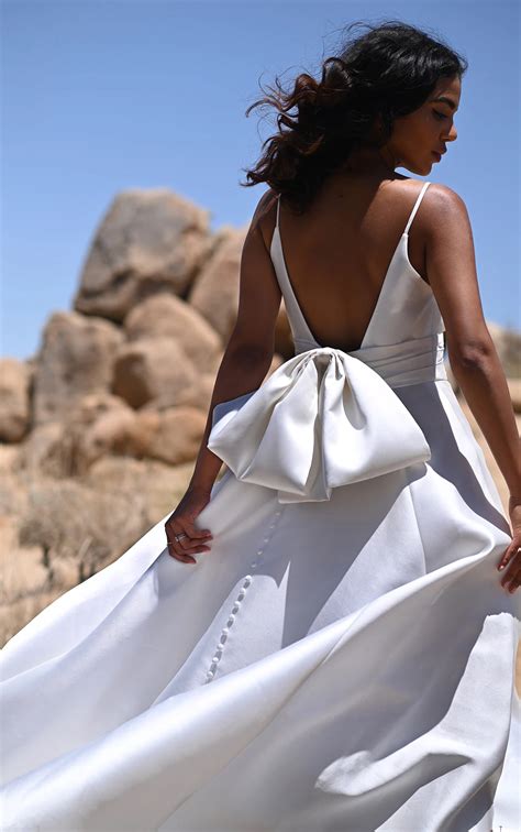 Simple Silk A Line Wedding Dress With Spaghetti Straps And Bow Back Detail