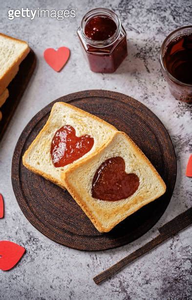 Sweet Sandwiches With Strawberry Jam With Heart Shape Inside For