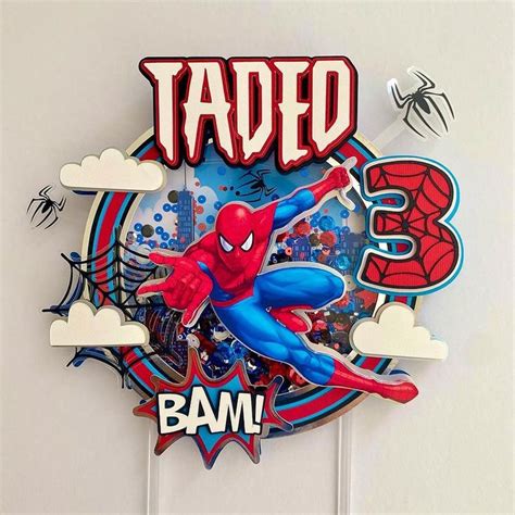 A Spiderman Birthday Cake Topper With The Name Tadd On It