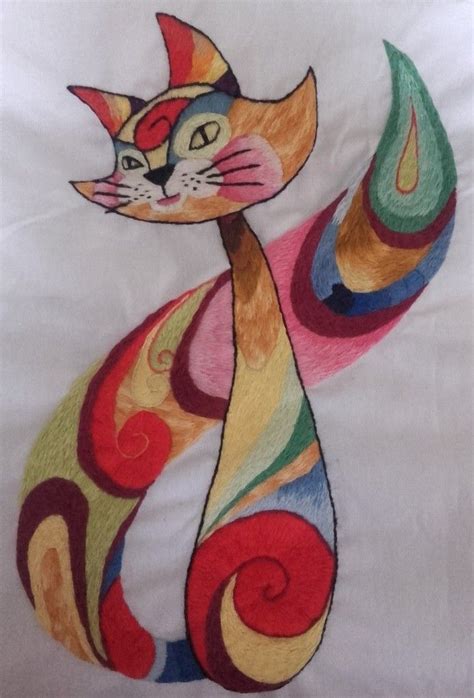 A Colorful Cat Is Depicted On A White Sheet