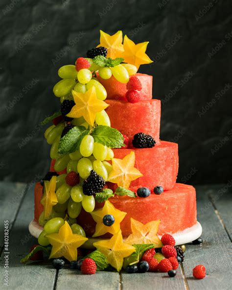 Three teir Cake that resembles a wedding cake made out of watermelon ...