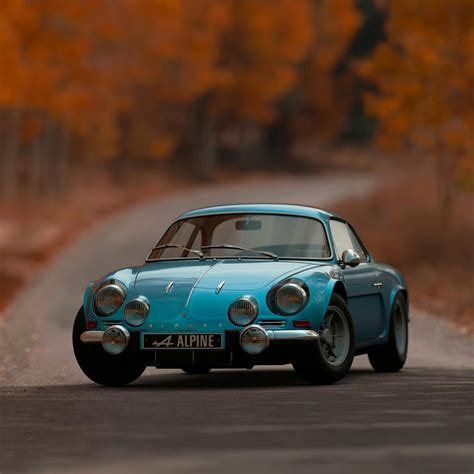 Shallow Focus Photography Of Blue Alpine Car · Free Stock Photo