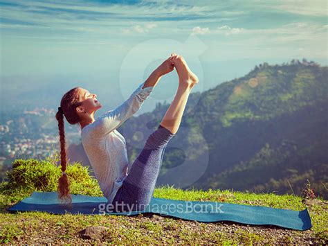 Woman Doing Ashtanga Vinyasa Yoga Asana Outdoors