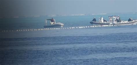 Chinese Forces Harass Philippine Fishermen at Scarborough Shoal