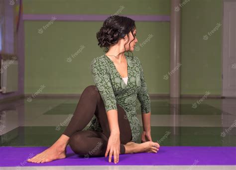 Premium Photo Yoga Instructor Poses Yoga Positions Yoga Master Stretches Yoga Poses In The Gym