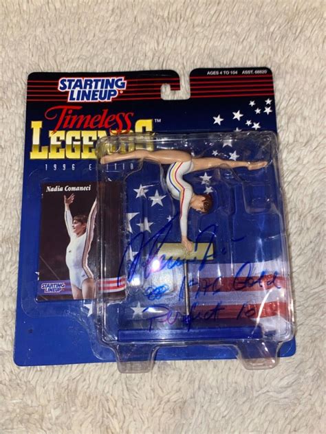 1996 SLU GYMNASTICS Auto NADIA COMANECI - TIMELESS LEGENDS 1976 GOLD