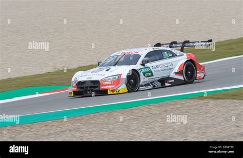 German racing driver René Rast in his Audi RS5 Turbo DTM car during a race at the TT circuit in ...