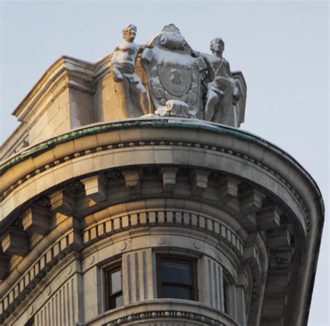 Snow Covers Statues On Top Of Flatiron Building Flatiron Building