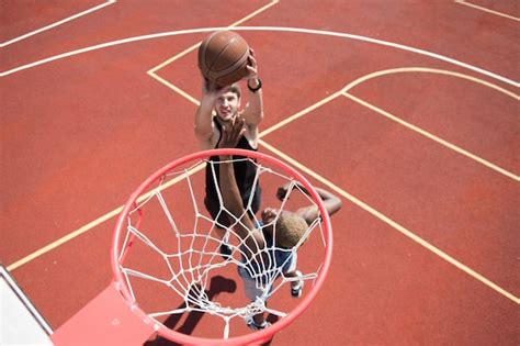 Premium Photo Man Scoring A Basket