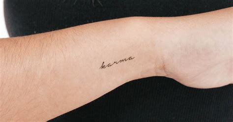 Karma Temporary Lettering Tattoo Located On The