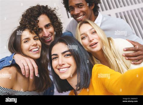 Multi Ethnic Group Of Friends Taking A Selfie Together While Having Fun