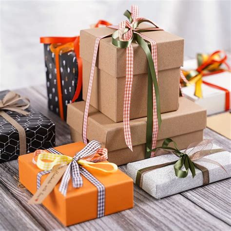 Several Wrapped Presents Are Sitting On A Wooden Table With Ribbons And