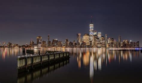 New York City Skyline at Night Stock Image - Image of colorful, little ...