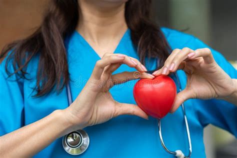 Female Cardiovascular Disease Doctor Or Cardiologist With Stethoscope