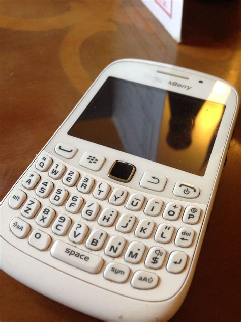 Blackberry Phone on Wooden Table