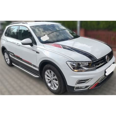 VW TIGUAN PASY BOCZNE I NA MASKĘ folia samochodowa za 249 zł z Warszawa