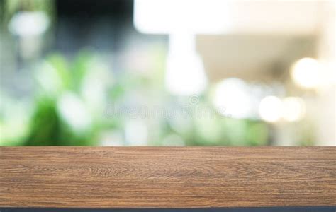 Wood Table Top In Blur Background Room Interior With Empty Copy Space