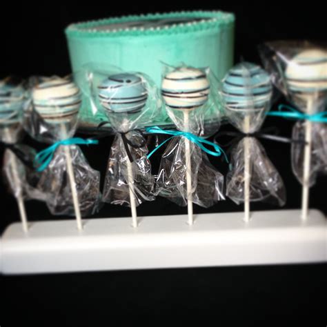 These Turquoise Black And White Cake Pops With Swirls Complimented The