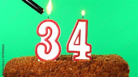 Cake with the number 34 lighted candle. Chroma key. Green Screen ...