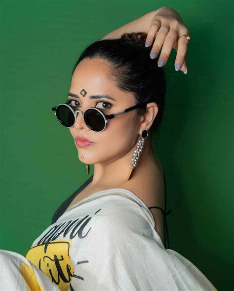 Anasuya Bharadwaj Hot Photoshoot In Sleeveless Saree Glamsundari In