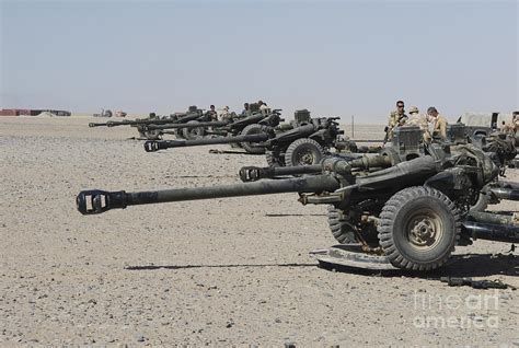 Howitzer 105mm Light Guns Are Lined Photograph By Andrew Chittock