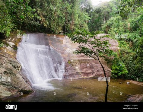 Waterfall in tropical rainforest, Penedo, Rio de Janeiro, Brazil Stock Photo - Alamy