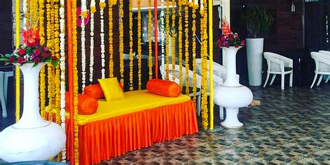 Gracious Yellow White Haldi Mehendi Setup Floral Party Decorations