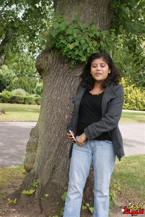 Cute Indian Girl Rupali Exposes Her Nice Tits While Underneath A Tree