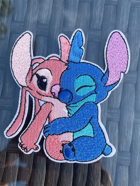 Stitch And Angel Hugging