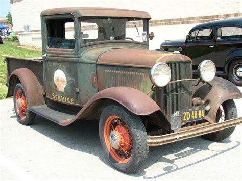 1934 Ford Truck Parked Among Antique Cars