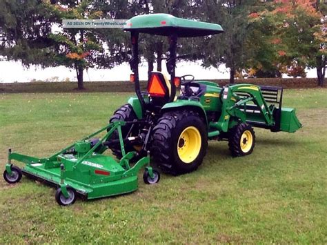 2006 4wd John Deere Tractor Loader/attachments