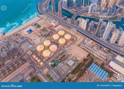 Aerial View Of Petrochemical Oil Refinery And Sea In Industrial