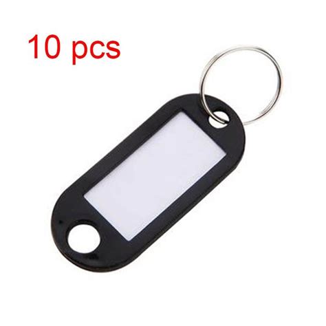 A Black Keychain With A White Blank Screen On The Front And Back Side