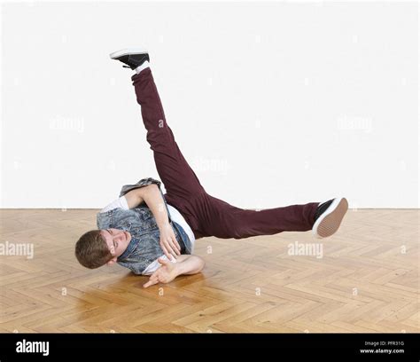 Teenage performing breakdance moves Stock Photo - Alamy